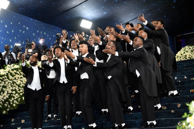An cappella gospel choir performance of Marvin Gaye and Tammi Terrell's "Ain't No Mountain High Enough" at The Metropolitan Museum of Art's Costume Institute benefit gala celebrating the opening of the "Superfine: Tailoring Black Style" exhibition on Monday, May 5, 2025, in New York. (Photo by Evan Agostini/Invision/AP)