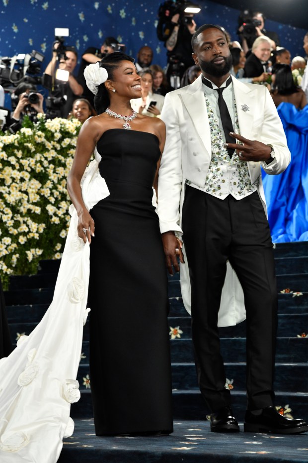 Gabrielle Union, left, and Dwyane Wade attend The Metropolitan Museum of Art's Costume Institute benefit gala celebrating the opening of the "Superfine: Tailoring Black Style" exhibition on Monday, May 5, 2025, in New York. (Photo by Evan Agostini/Invision/AP)