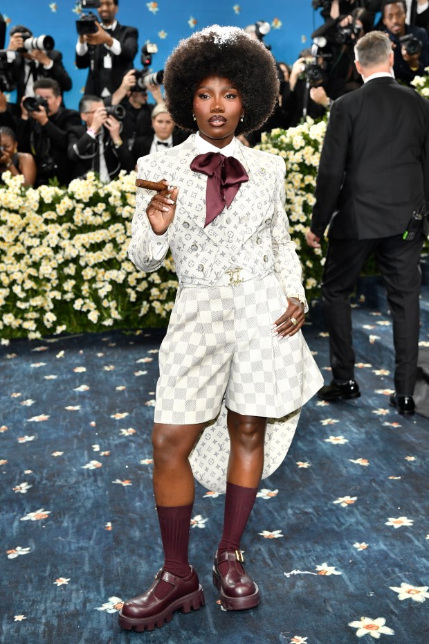 Doechii attends The Metropolitan Museum of Art's Costume Institute benefit gala celebrating the opening of the "Superfine: Tailoring Black Style" exhibition on Monday, May 5, 2025, in New York. (Photo by Evan Agostini/Invision/AP)