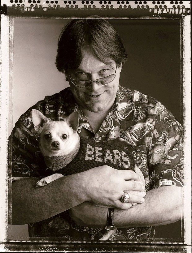 A portrait from 2005 of Steve McMichael with his dog Chula. (Charles Cherney/Chicago Tribune)