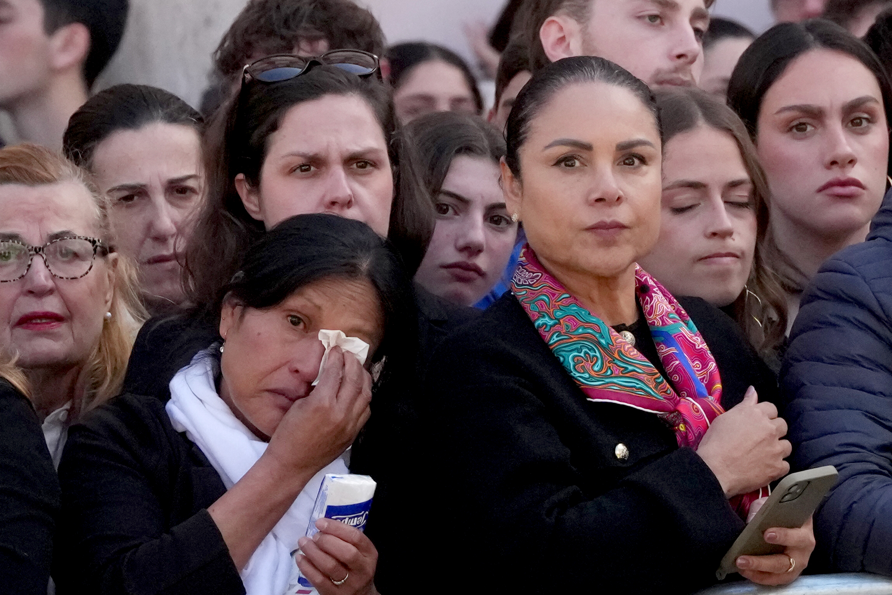 People line the streets as the coffin of Pope Francis is transported to the Basilica of Santa Maria Maggiore for burial on April 26, 2025 in Rome, Italy. Pope Francis died on April 21st, aged 88. Anointed in 2013, Argentinian Jorge Mario Bergoglio was the first Latin American and Jesuit Pope. Taking the name Francis after St Francis of Assisi, he was a more humble Pope than many of his predecessors and will be buried outside of the Vatican in a simple wooden coffin at the Basilica Santa Maria Maggiore. (Photo by Christopher Furlong/Getty Images)