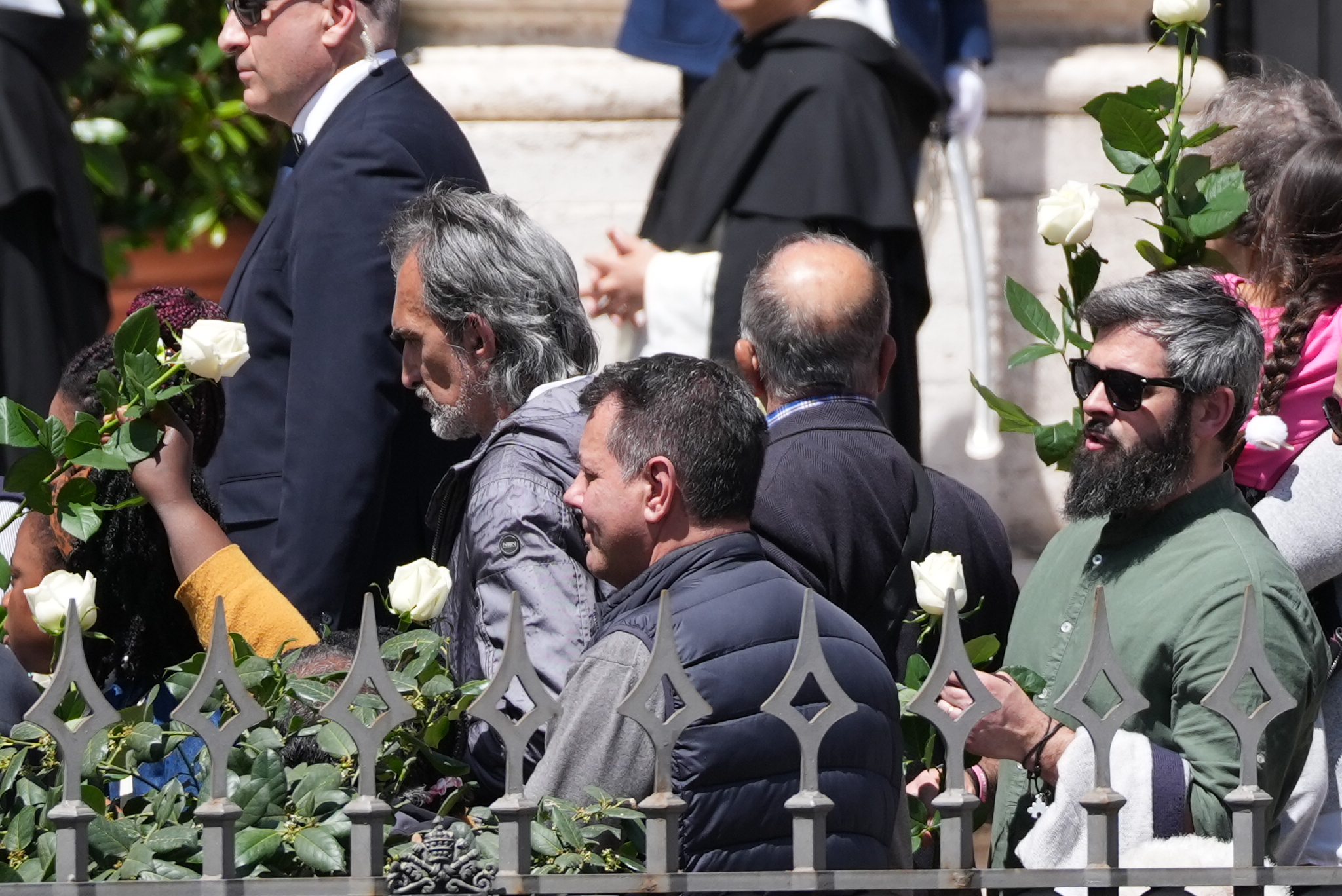 A representative group described by the Vatican as the "poor and needy" welcome the coffin of Pope Francis as it arrives at the Basilica of Santa Maria Maggiore on April 26, 2025 in Rome, Italy. Pope Francis died on April 21st, aged 88. Anointed in 2013, Argentinian Jorge Mario Bergoglio was the first Latin American and Jesuit Pope. Taking the name Francis after St Francis of Assisi, he was a more humble Pope than many of his predecessors and will be buried outside of the Vatican in a simple wooden coffin at the Basilica of Santa Maria Maggiore. (Photo by Christopher Furlong/Getty Images)
