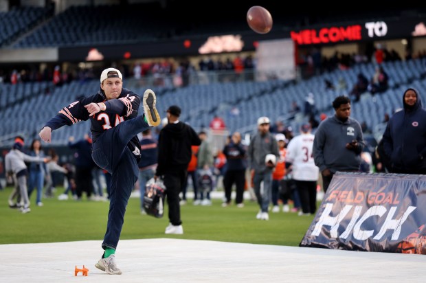 Hunter Buchanan kicks a field goal while attending the Bears draft party at Soldier Field on April 24, 2025. (Chris Sweda/Chicago Tribune)