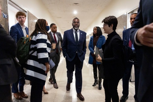 Mayor Brandon Johnson departs with staff members after a meeting with Gov. JB Pritzker at the Stratton Building next door to the Illinois State Capitol on April 30, 2025. (Brian Cassella/Chicago Tribune)