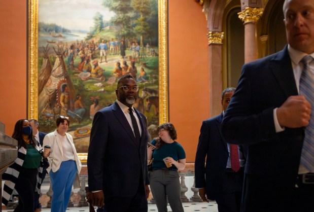 Mayor Brandon Johnson walks between meetings with lawmakers at the Illinois State Capitol, April 30, 2025, in Springfield. (Brian Cassella/Chicago Tribune)