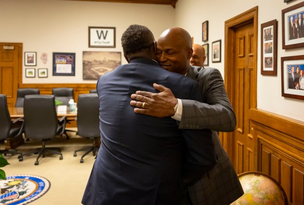 House Speaker Emanuel "Chris" Welch greets Mayor Brandon Johnson as he visits the Illinois State Capitol to meet with lawmakers, April 30, 2025, in Springfield. (Brian Cassella/Chicago Tribune)