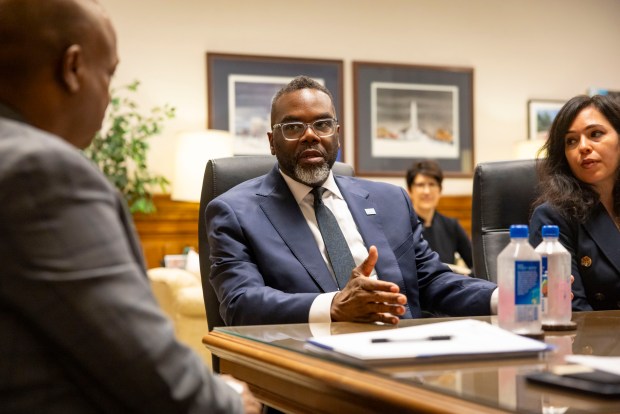 House Speaker Emanuel "Chris" Welch meets with Mayor Brandon Johnson alongside his chief of staff Cristina Pacione-Zayas in Welch's office at the Illinois State Capitol on April 30, 2025, in Springfield. (Brian Cassella/Chicago Tribune)