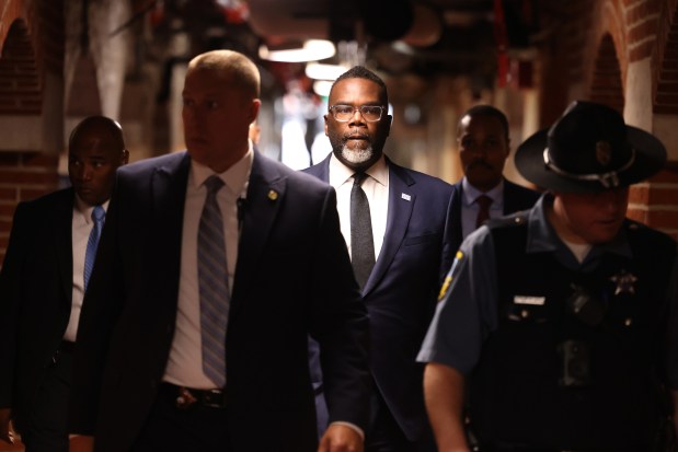 Chicago Mayor Brandon Johnson walks to the Blue Room to talk to lawmakers at the Illinois State Capitol, April 30, 2025. (Brian Cassella/Chicago Tribune)