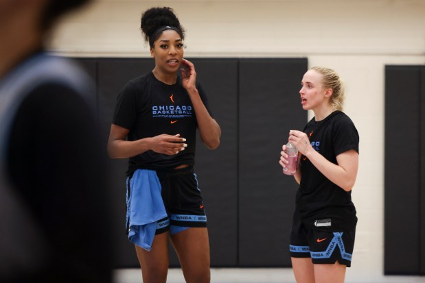 Sky guard Hailey Van Lith, right, speaks to center Jessika Carter during the first day of training camp Sunday, April 27, 2025, at Sachs Recreation Center in Deerfield. (Eileen T. Meslar/Chicago Tribune)