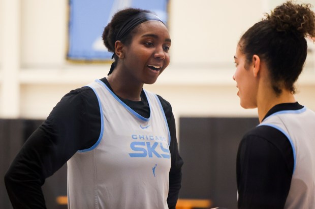 Sky center Elizabeth Williams, left, speaks to guard Kia Nurse at the end of the first day of training camp Sunday, April 27, 2025, at Sachs Recreation Center in Deerfield. (Eileen T. Meslar/Chicago Tribune)