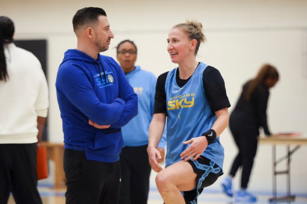 Sky general manager Jeff Pagliocca speaks to guard Courtney Vandersloot at the end of the first day of training camp Sunday, April 27, 2025, at Sachs Recreation Center in Deerfield. (Eileen T. Meslar/Chicago Tribune)