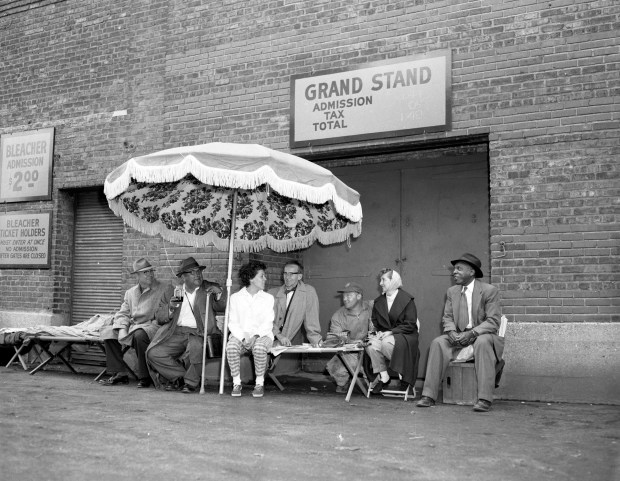 White Sox early bird customers wait outside Comiskey Park in October, 1959, to get into the World Series game. (Steve Lasker/Chicago Tribune)