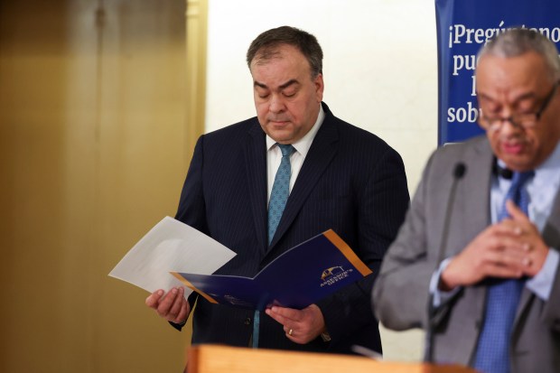 Cook County Assessor Fritz Kaegi looks over materials at a press conference in the Cook County office building, March 5, 2025, announcing the opening of exemption applications for Cook County homeowners. (Eileen T. Meslar/Chicago Tribune)