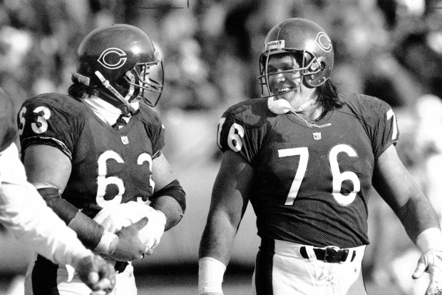 Steve McMichael played in 191 games during 13 seasons with the Bears and retired second on the Bears' career sacks list with 92.5. He was a member of the Bears' 1985 Super Bowl team and made 2 Pro Bowls. Here, McMichael lights up in a smile as he and Jay Hilgenberg leave the field after the Bears victory over Tampa on Dec. 14, 1991, at Soldier Field. (Nancy Stone/Chicago Tribune) 