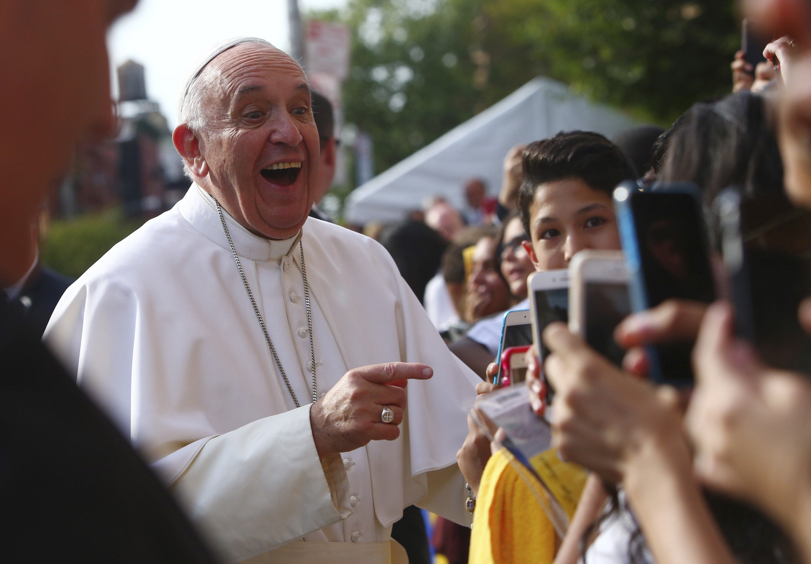 Pope Francis is greeted by well-wishers upon his arrival to Our Lady Queen of Angels School in the East Harlem neighborhood of New York on Sept. 25, 2015. Pope Francis, who rose from modest means in Argentina to become the first Jesuit and Latin American pontiff, died at the Vatican on Monday, April 21, 2025. He was 88. (Eric Thayer/The New York Times)