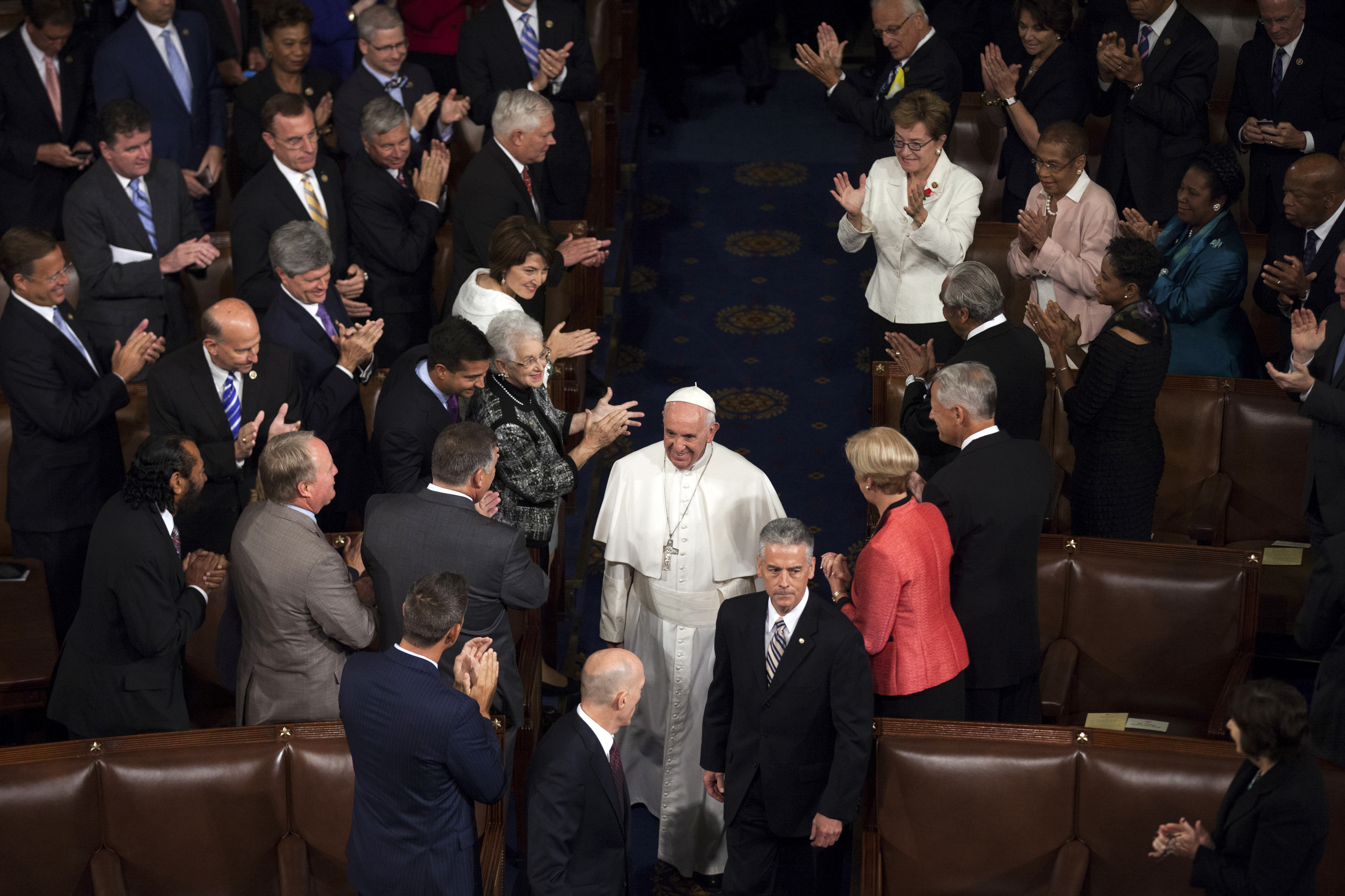 Pope Francis enters the House Chamber before addressing a joint meeting of Congress at the Capitol in Washington on Sept. 24, 2015. Francis was the first pontiff to address the U.S. Congress. (Zach Gibson/The New York Times)