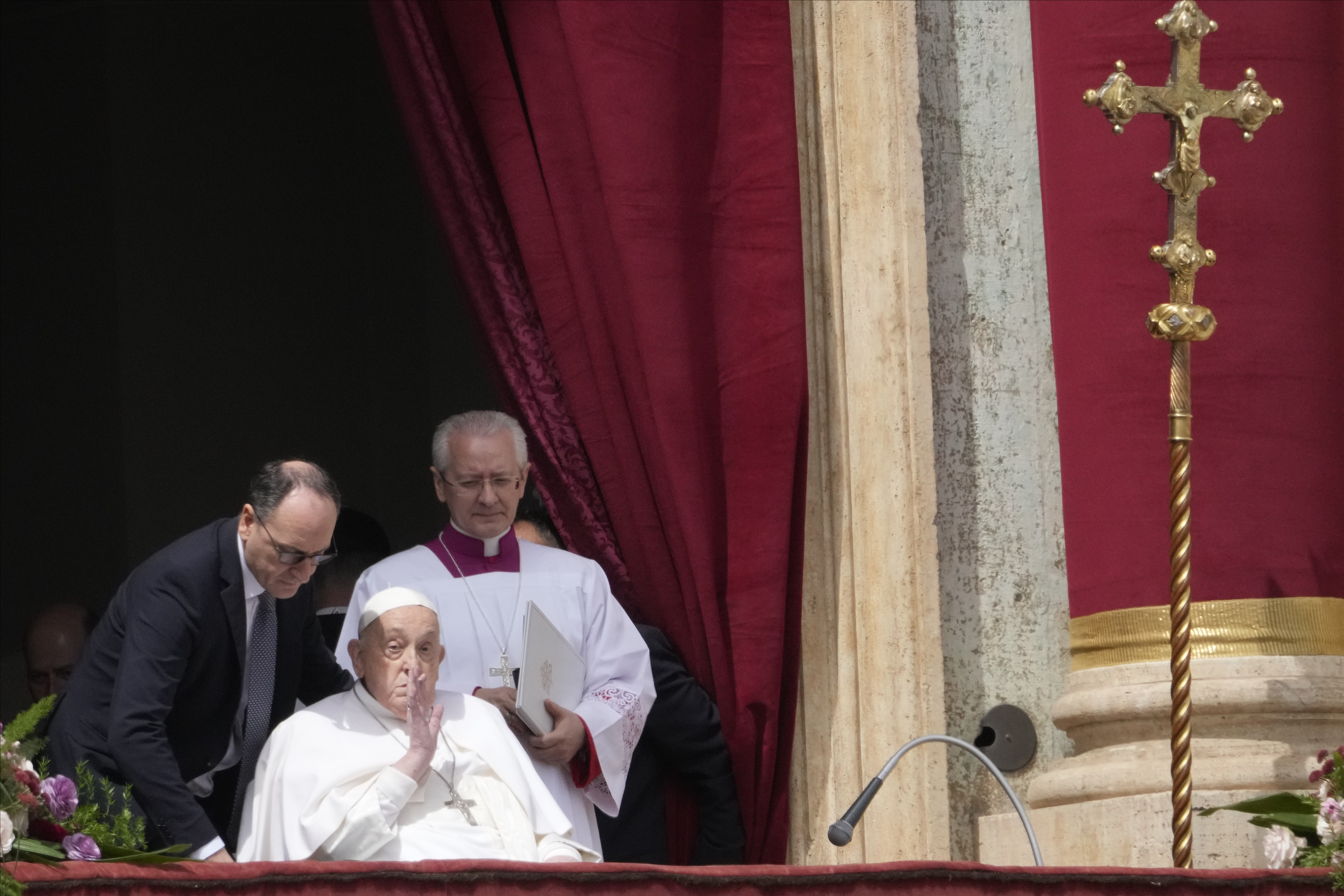 Pope Francis bestows the Urbi et Orbi (Latin for to the city and to the world) blessing from the central lodge of St. Peter's Basilica at the end of the Easter mass presided over by Cardinal Angelo Comastri in St. Peter's Square at the Vatican Sunday, April 20, 2025. (Gregorio Borgia/AP)