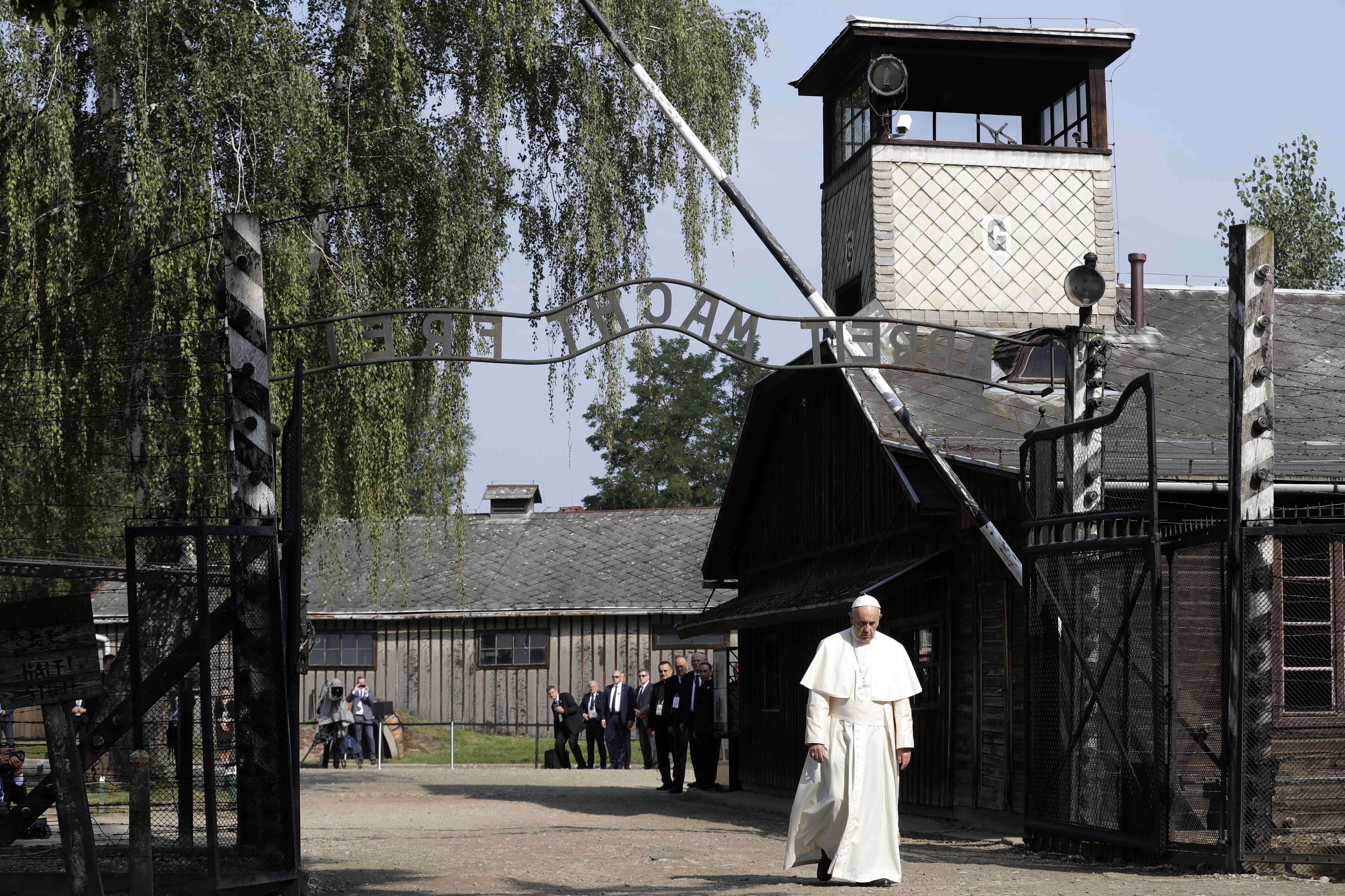 Pope Francis walks through the gate of the former Nazi German death camp of Auschwitz in Oswiecim, Poland, July 29, 2016. (Gregorio Borgia/AP)