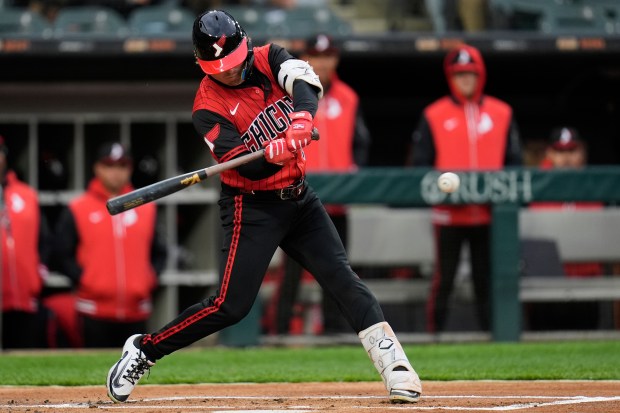 Chicago White Sox's Chase Meidroth hits a single during the first inning of a baseball game against the Houston Astros, Friday, May 2, 2025, in Chicago. (AP Photo/Erin Hooley)