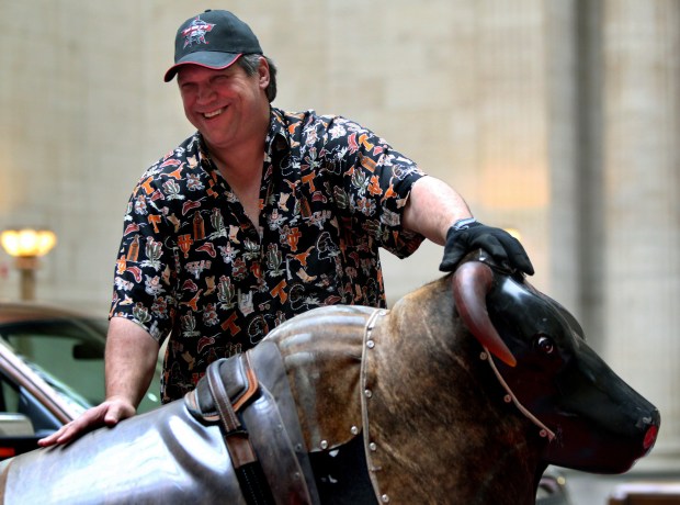 Steve McMichael has a laugh before battling Corey Wootton in a mechanical bull riding competition at Union Station in Chicago on March 4, 2011. The event was held to kick off the Professional Bull Riders' inaugural Chicago Invitational this weekend. (Chris Sweda/Chicago Tribune)