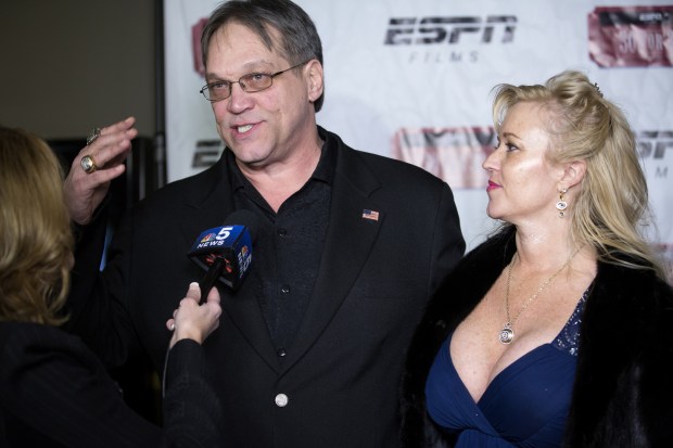 Former Bears defensive tackle Steve McMichael with his wife Misty at an advanced screening of "The "85 Bears" documentary about the Super Bowl XX champions on Jan. 27, 2016, at the AMC River East 21 theater in Chicago. This year marks the 30th anniversary of the Bears' win. (Erin Hooley/Chicago Tribune)