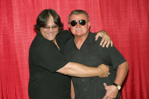 Steve McMichael mugs with Mike Ditka at a Bears event in Rosemont on Aug. 1, 2005. (Callie Lipkin/Chicago Tribune)